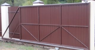 Купить откатные ворота из профнастила Чайковский, цена от 1734 руб.